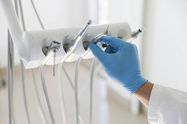 Professional Tooth Extraction technician working in Manteo, NC